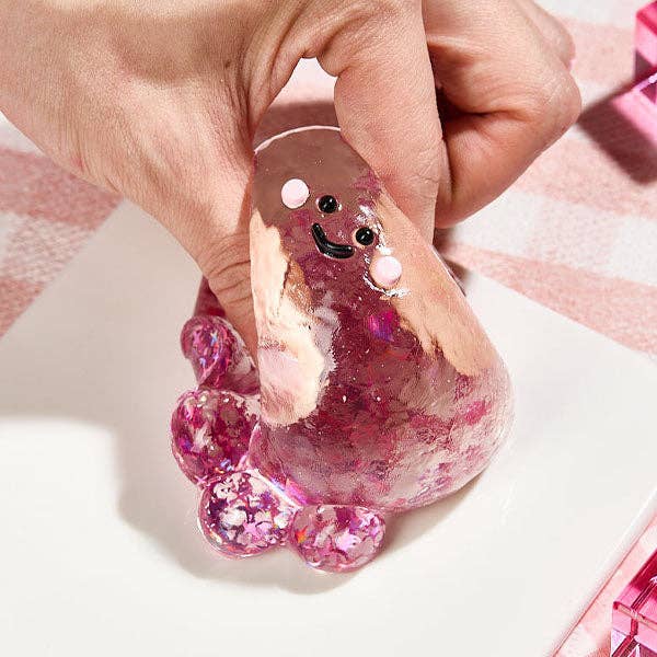Showcase - SqueezeSquad Taba Deluxe Premium Silicone Squishy Fidget Toy - Fuchsia Octopus