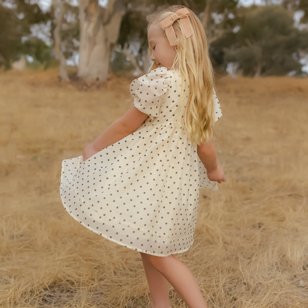 noralee_luna_dress_flocked_daisy_natural_model